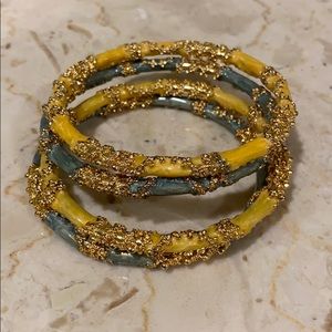 Set of four designer bracelets